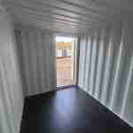 8×20 ONE TRIPPER Storage Container with Man Door
